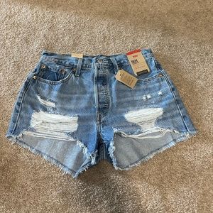 New womens Levi’s 501 Original denim shorts quiet riot distressed